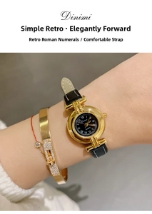 Elegant vintage ladies gold quartz watch with black Roman numeral dial and black leather strap