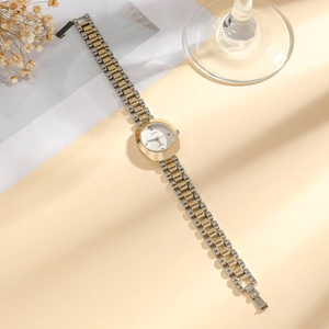 Elegante Damen-Quarzuhr in Bi-Color mit Tonneau-Zifferblatt auf warmem beigem Grund