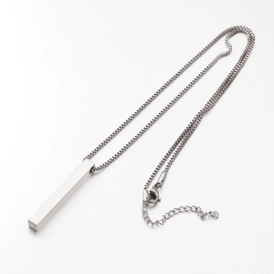 Detailed view of silver stainless steel bar pendant necklace with sleek box chain