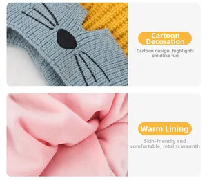 Detailed view of the warm fleece lining and blue knitted texture on children's winter hat