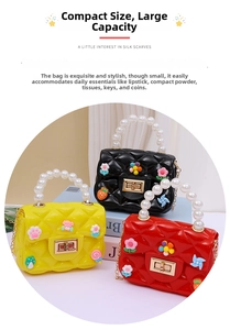 Detailed view of mini crossbody bags with pearl handles and colorful floral patches