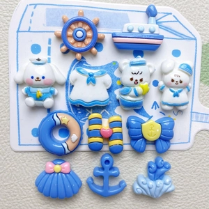 Blue and white nautical resin charm set featuring ship, anchor, and sailor animals