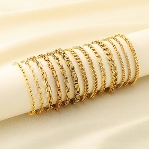 Detailed macro view of various 18K gold plated stainless steel chain styles for jewelry