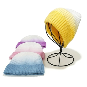 Colorful tie-dye knitted beanie for women featuring gradient yellow and purple wool textures
