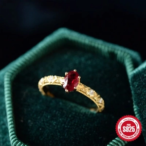 Elegant vintage S925 sterling silver ring with oval ruby gemstone in gold hollow design