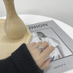 Minimalist S925 sterling silver multi-layer V-shape ring with beads worn by a model