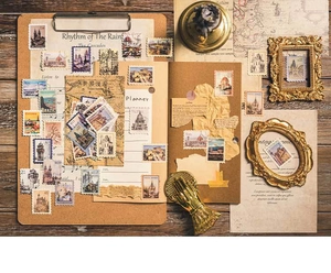 Close-up of vintage landscape stamp stickers with landmarks for DIY scrapbooking