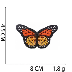 Detail of butterfly embroidery patch showing 8x4.5cm dimensions and 1.8g weight