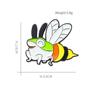 Technical view showing the 2.6cm x 3.0cm dimensions and 5.8g weight of this enamel pin