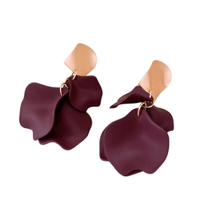 Elegant gold geometric earrings with layered burgundy acrylic flower petals on white background