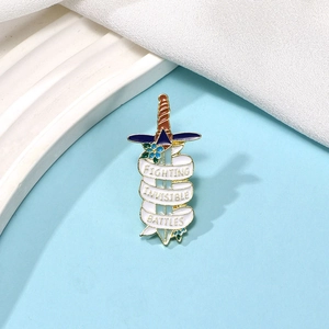 Cartoon sword enamel pin with Fighting Invisible Battles banner on blue background
