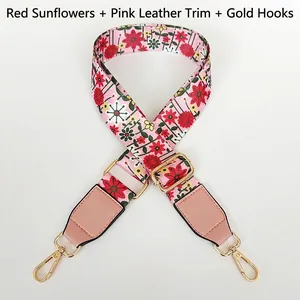 Adjustable wide floral strap with pink leather ends and gold metal hooks for cross-body bags