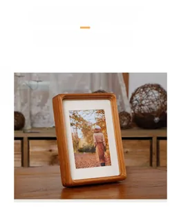 Close-up of a rounded corner black walnut wood frame with a minimalist Nordic design