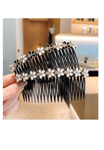 Dettaglio di pettine per capelli floreale con strass e denti antiscivolo per acconciature