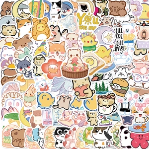 Close-up of waterproof cartoon stickers featuring cute cats and dogs in macaron colors