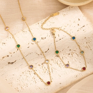 Elegant gold titanium steel jewelry set with colorful round gemstones and lobster clasp