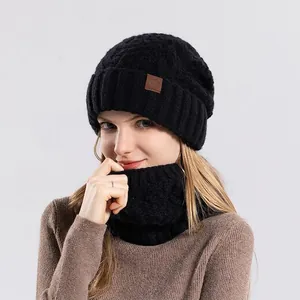 Women's winter black cable knit beanie hat and neck warmer scarf set with leather patch