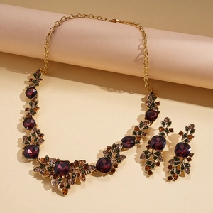 Vintage necklace and earring set with geometric burgundy stones and green rhinestones