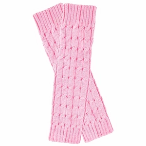 Detailed view of pink cable knit leg warmers showing intricate braided texture and soft yarn
