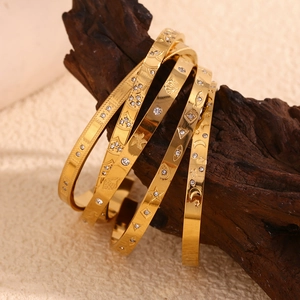 18K gold plated stainless steel bangles with sea patterns and sparkling crystals