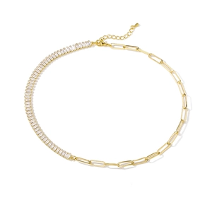 Detail of gold necklace featuring zircon tennis chain and paperclip links with lobster clasp