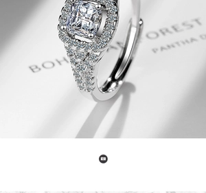 Macro shot of cushion cut silver ring with halo setting and pave sparkling diamonds