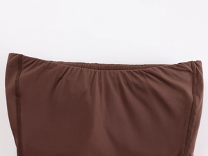 Macro detail of high-elasticity brown fabric with elastic waistband and double-needle stitching