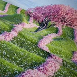 Detailed texture of bohemian tapestry showing cherry blossom print and soft fabric fibers