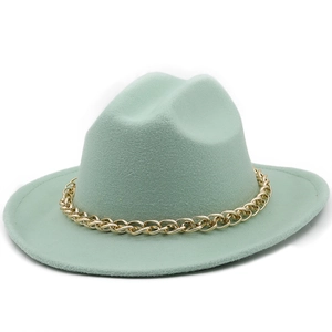 Mint green wool felt cowboy hat featuring a bold gold chain band and flat brim