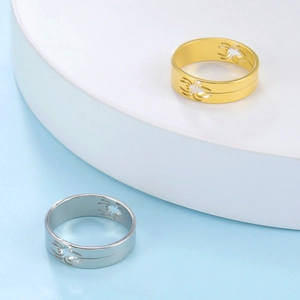 Unisex hollow spider pattern rings in gold and silver stainless steel finishes