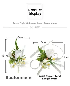 Detailed view of white artificial wedding corsage and wristlet set with green leaves