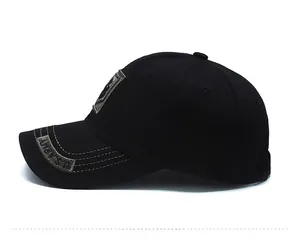 Detailed side view of black tactical baseball cap featuring embroidery and breathable eyelets