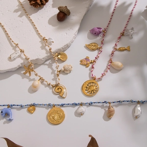 Bohemian handmade rope necklaces with ocean charms, pearls and gold starfish pendants