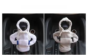 Close-up of creative mini hoodie car gear shift covers in white and grey fabric