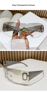 Detail of Y2K wrap-around sunglasses with grey lenses and rhinestone metal decor