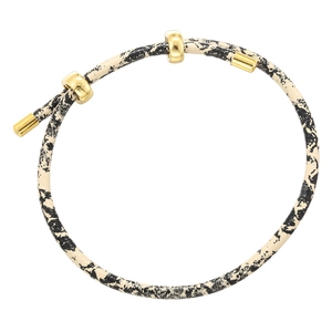 Detail of leopard pattern cord bracelet with three gold sliding infinity buckle rings