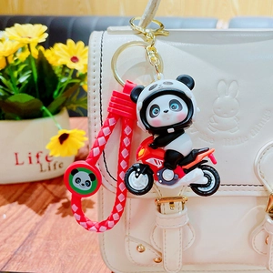 Creative cartoon panda on motorcycle keychain with red braided strap for bags