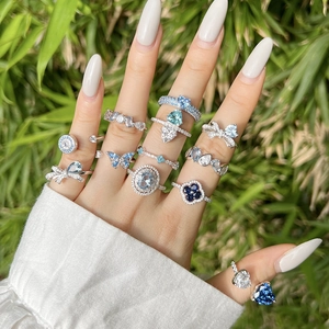 Elegant S925 silver ring set with blue water-drop zircon and butterfly motifs