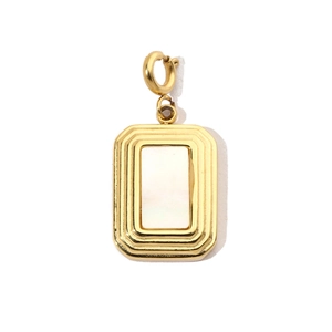Detailed view of rectangular golden shell pendant with decorative tiered edges and spring clasp
