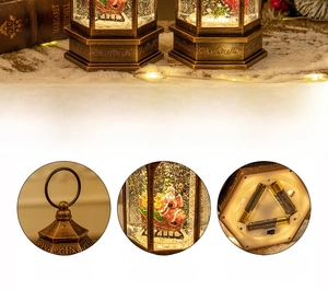 Dettaglio lanterna natalizia in bronzo con design a slitta di Babbo Natale e anello