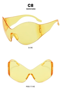 Front and side views of yellow frameless Y2K oversized sunglasses with tech-style shield lens