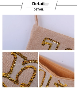 Macro detail of burlap Christmas stocking featuring gold sequins and soft plush lining