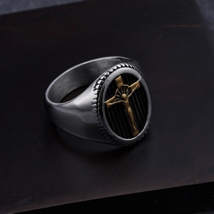 Retro stainless steel cross ring for men featuring a gold crucifix on a black textured base
