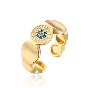 Macro view of gold plated evil eye ring featuring blue and white zircon micro inlay