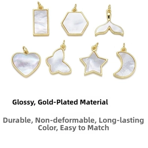 Detailed set of seven gold-plated shell pendants in star, butterfly, and heart shapes