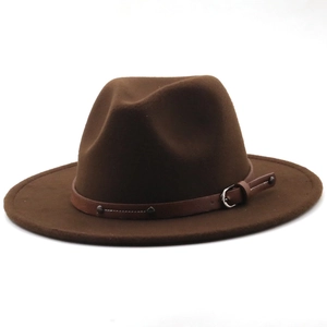 Detail of dark brown wool fedora with studded leather band and metallic buckle
