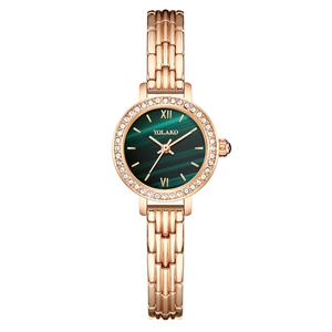 Elegant rose gold women's watch with malachite green dial and crystal-set bezel
