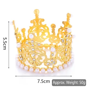 Detailed view of a gold alloy mini crown with pearls and crystals measuring 7.5cm