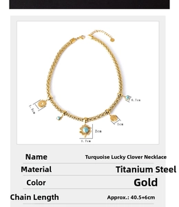 Detail view of gold titanium clover necklace with turquoise and measurement labels