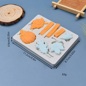Silicone mold featuring pumpkins, sunflowers, and fall leaf patterns for cake decorating